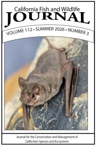 Cover of the Journal with an image of a small brown bat with a free tail (Mexican free-tailed bat)